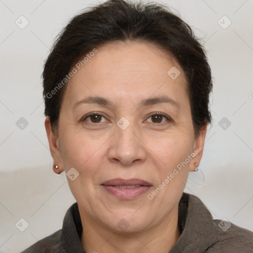 Joyful white adult female with short  brown hair and brown eyes