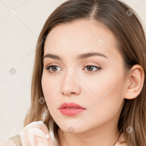 Neutral white young-adult female with long  brown hair and brown eyes