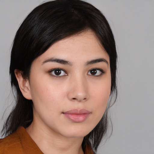 Neutral white young-adult female with medium  black hair and brown eyes