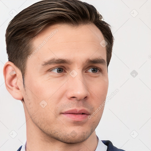 Neutral white young-adult male with short  brown hair and brown eyes