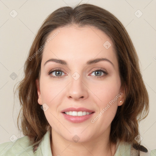 Joyful white young-adult female with medium  brown hair and green eyes