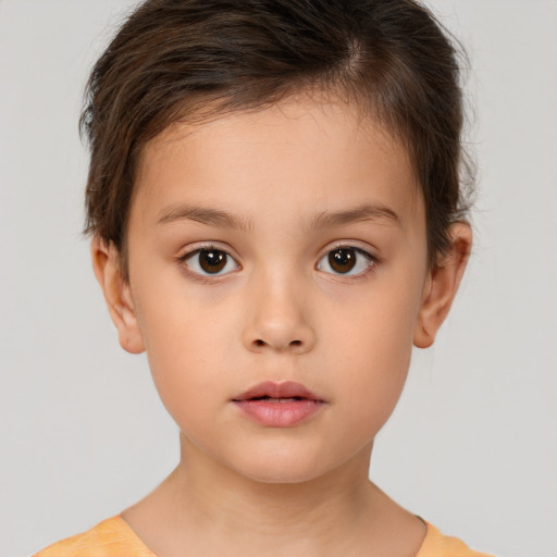 Neutral white child female with short  brown hair and brown eyes