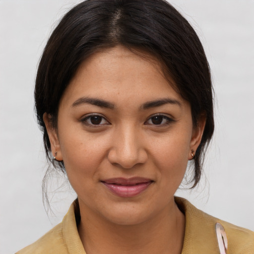 Joyful white young-adult female with medium  brown hair and brown eyes