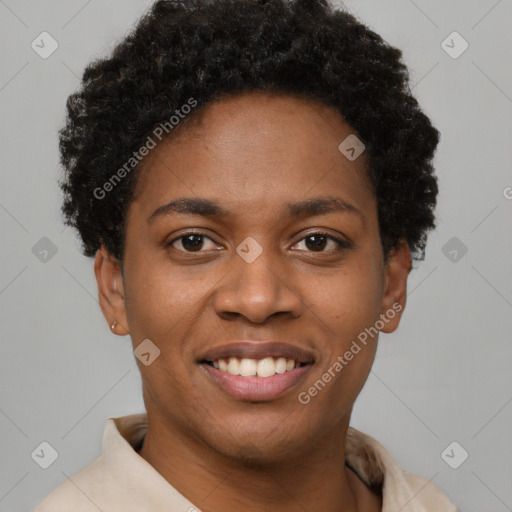 Joyful black young-adult female with short  brown hair and brown eyes