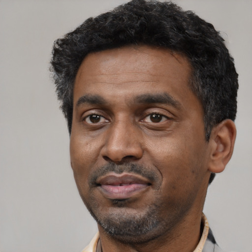 Neutral black adult male with short  black hair and brown eyes