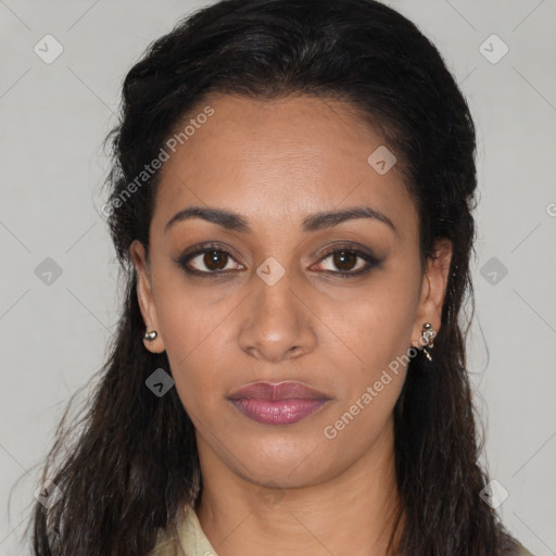 Joyful latino young-adult female with long  black hair and brown eyes