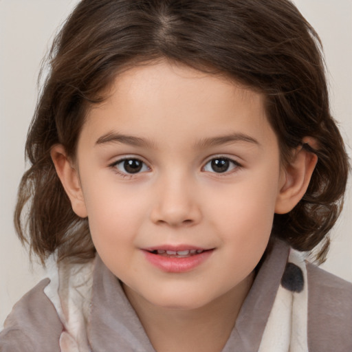 Joyful white child female with medium  brown hair and brown eyes