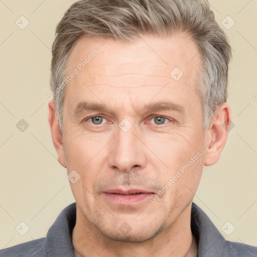 Neutral white adult male with short  brown hair and brown eyes