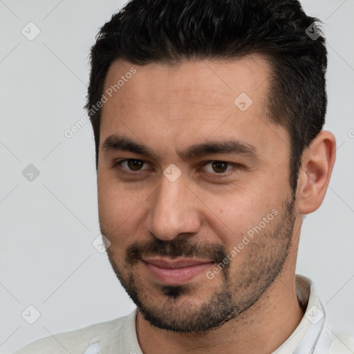 Neutral white young-adult male with short  brown hair and brown eyes