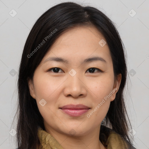 Joyful asian young-adult female with medium  brown hair and brown eyes