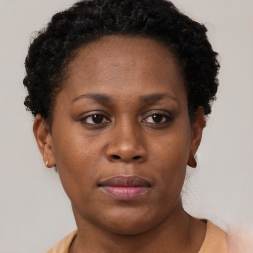 Neutral black young-adult female with short  brown hair and brown eyes