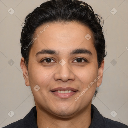 Joyful white young-adult male with short  black hair and brown eyes