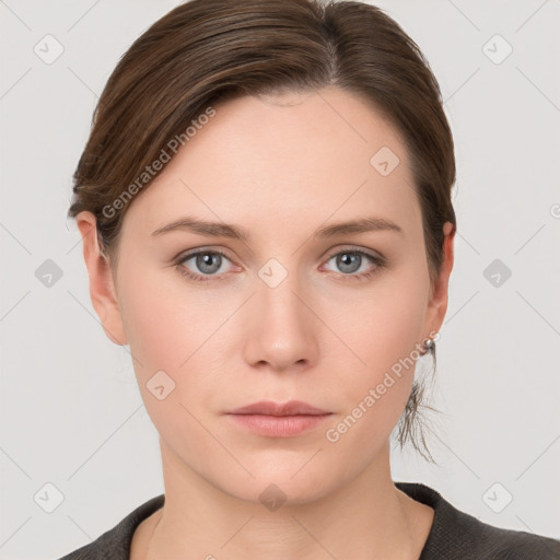 Neutral white young-adult female with short  brown hair and grey eyes