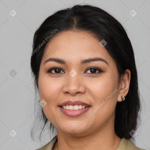 Joyful asian young-adult female with medium  black hair and brown eyes