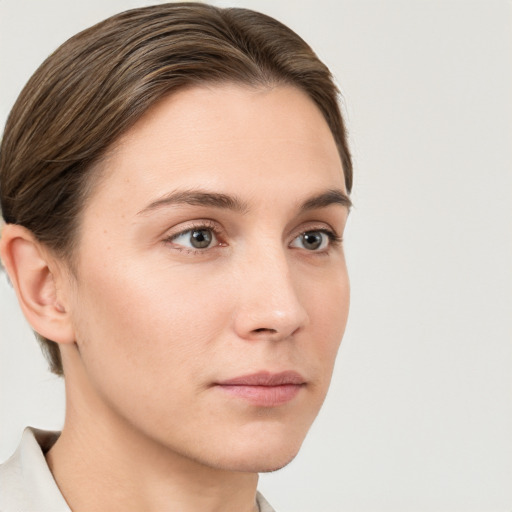 Neutral white young-adult female with short  brown hair and grey eyes