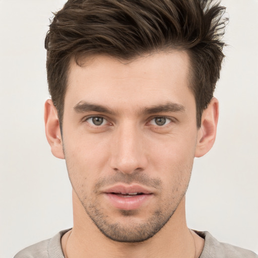 Neutral white young-adult male with short  brown hair and brown eyes