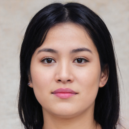 Neutral white young-adult female with long  black hair and brown eyes