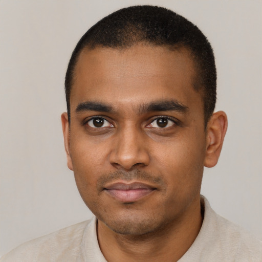 Neutral black young-adult male with short  black hair and brown eyes