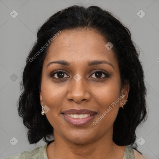 Joyful black young-adult female with medium  brown hair and brown eyes