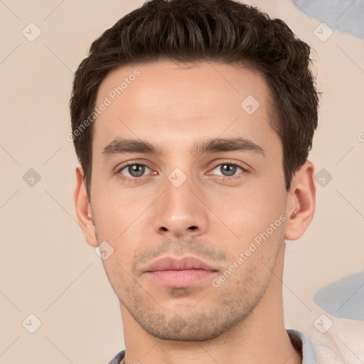 Neutral white young-adult male with short  brown hair and brown eyes