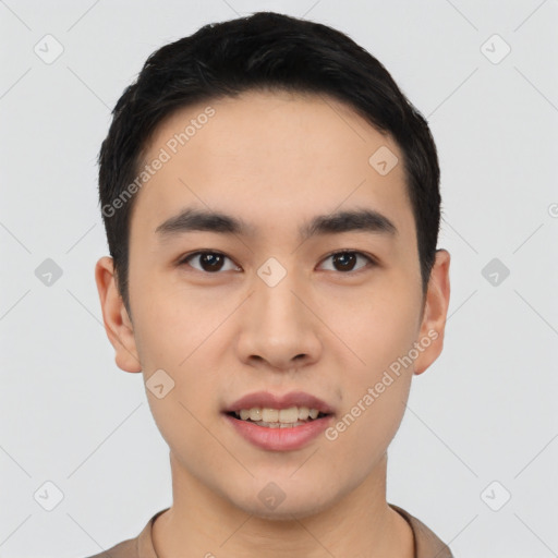 Joyful asian young-adult male with short  black hair and brown eyes