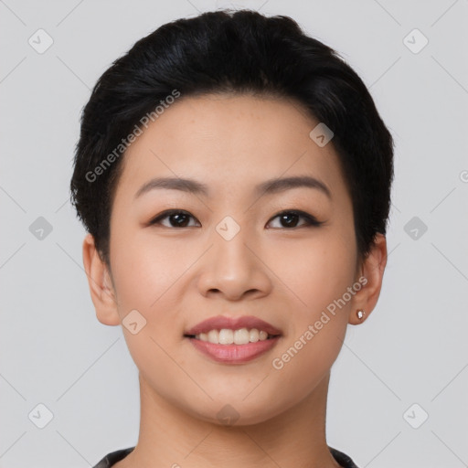 Joyful asian young-adult female with short  black hair and brown eyes