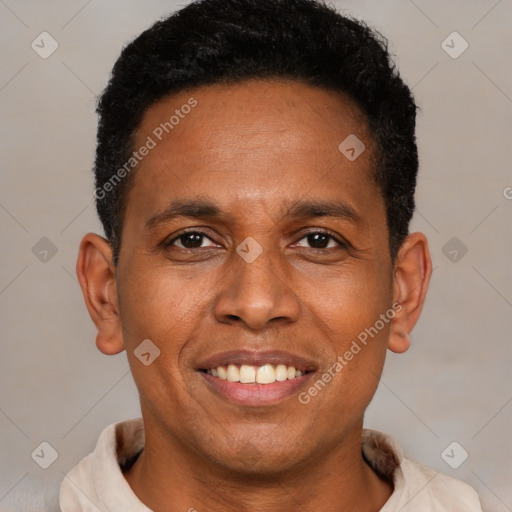 Joyful latino young-adult male with short  brown hair and brown eyes