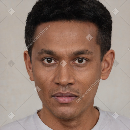 Neutral latino young-adult male with short  black hair and brown eyes