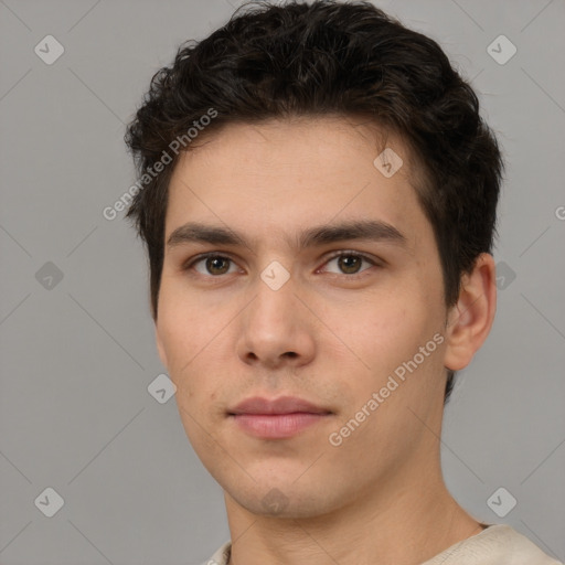 Neutral white young-adult male with short  brown hair and brown eyes