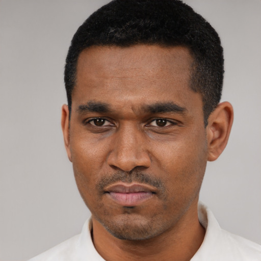 Neutral black young-adult male with short  black hair and brown eyes
