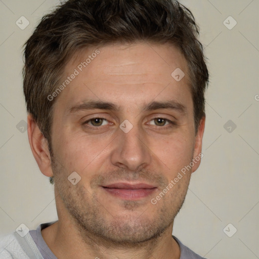 Joyful white adult male with short  brown hair and grey eyes