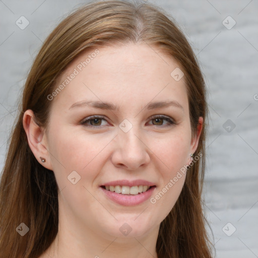 Joyful white young-adult female with long  brown hair and blue eyes