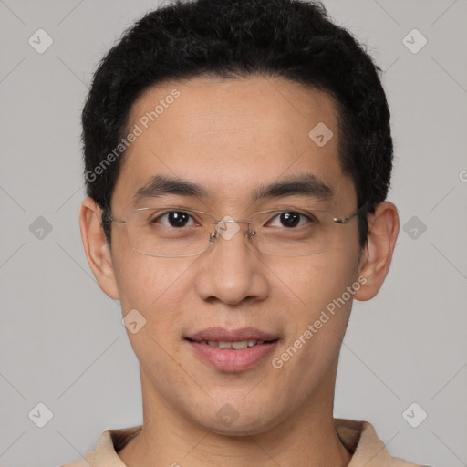 Joyful latino young-adult male with short  brown hair and brown eyes