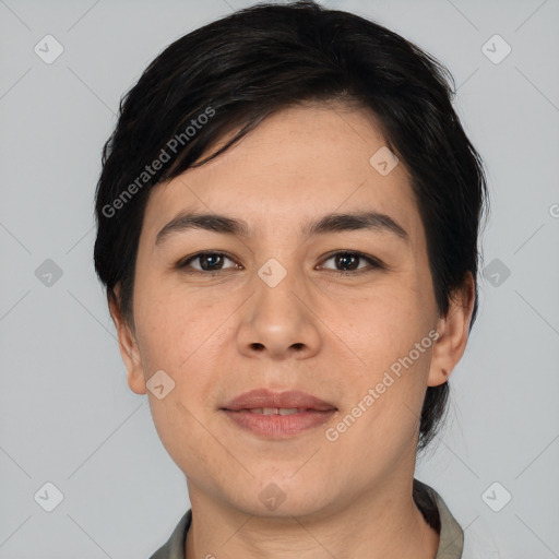 Joyful white young-adult male with short  black hair and brown eyes