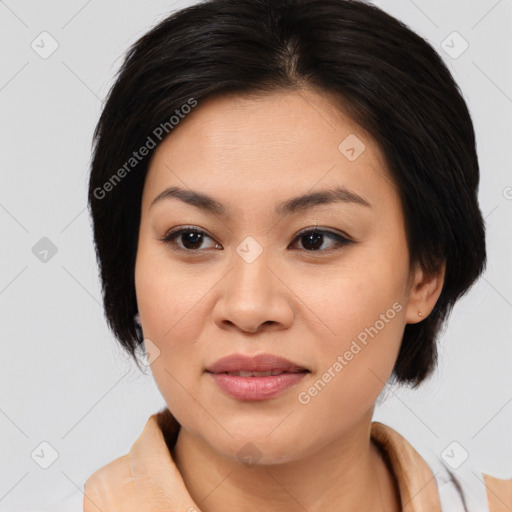 Joyful asian young-adult female with medium  brown hair and brown eyes