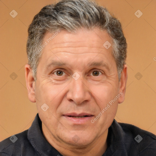 Joyful white middle-aged male with short  brown hair and brown eyes