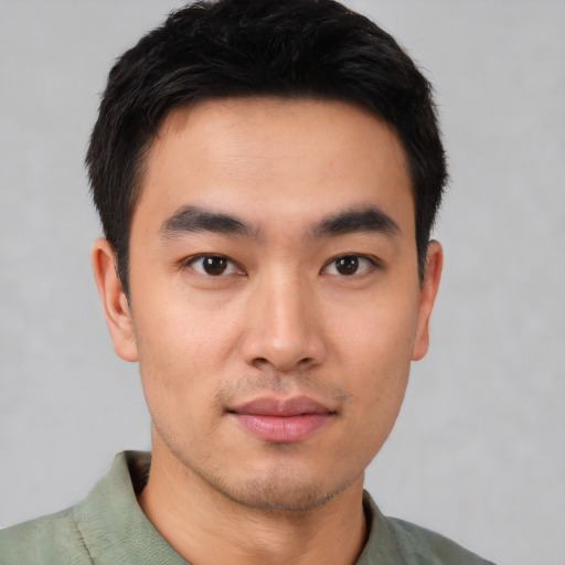 Neutral asian young-adult male with short  black hair and brown eyes