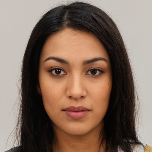 Neutral latino young-adult female with long  brown hair and brown eyes