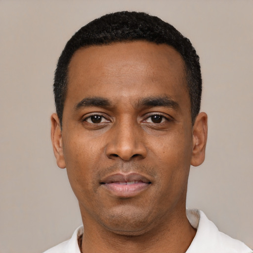 Neutral black young-adult male with short  black hair and brown eyes