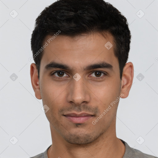 Neutral white young-adult male with short  black hair and brown eyes