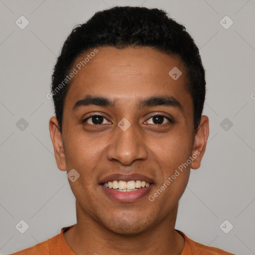 Joyful latino young-adult male with short  black hair and brown eyes