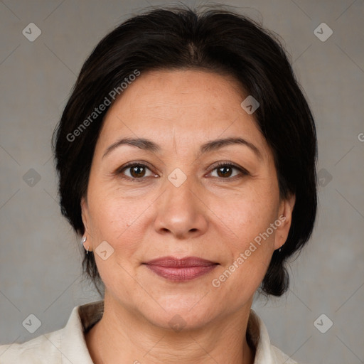 Joyful white adult female with medium  brown hair and brown eyes