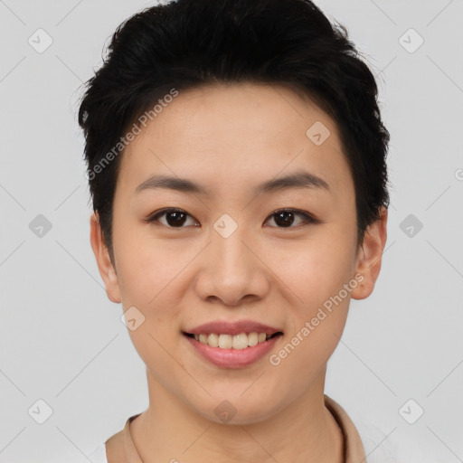 Joyful asian young-adult female with short  black hair and brown eyes