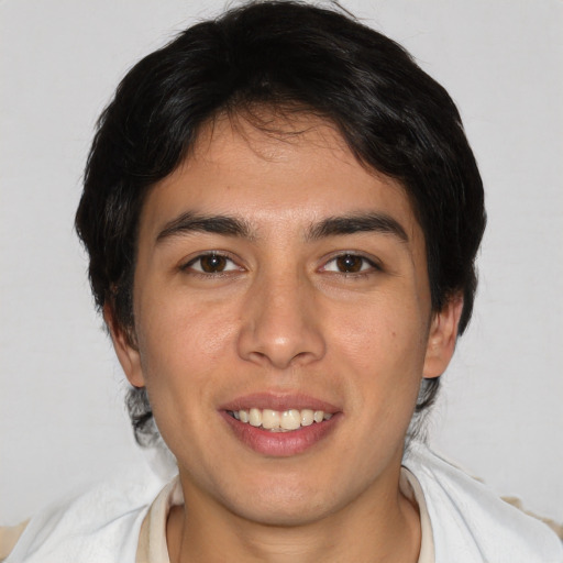 Joyful white young-adult male with medium  brown hair and brown eyes