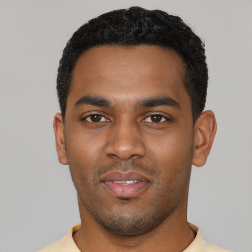 Neutral black young-adult male with short  black hair and brown eyes