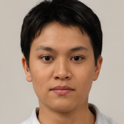Neutral asian young-adult male with short  brown hair and brown eyes