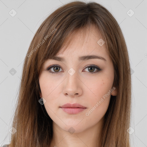 Neutral white young-adult female with long  brown hair and brown eyes