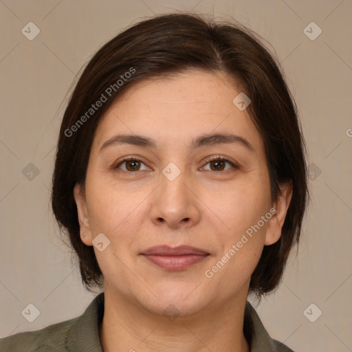 Joyful white young-adult female with medium  brown hair and brown eyes