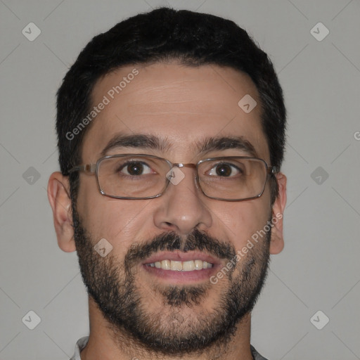 Joyful white adult male with short  black hair and brown eyes