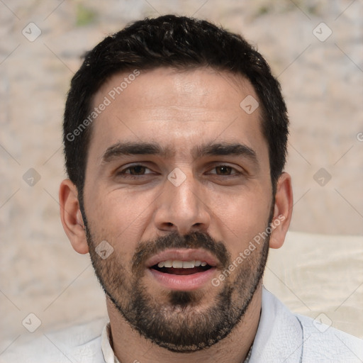 Joyful white young-adult male with short  black hair and brown eyes